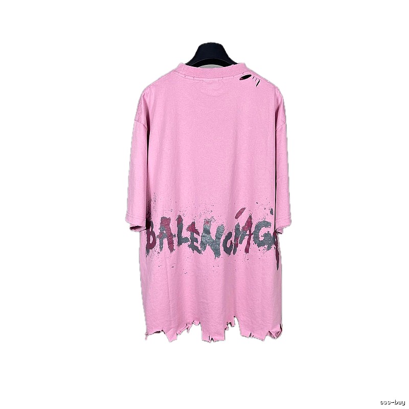 Balenciaga's pink T-shirt with a hole and graffiti style