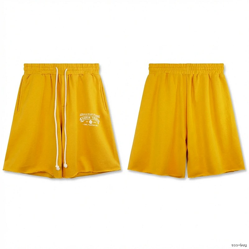 DENIM TEARS American-style yellow shorts