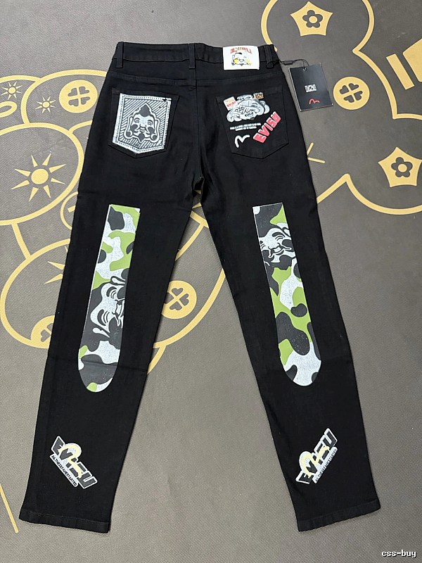 Evisu Weekend Patchwork Jeans with camouflage inserts and mixed graphic badges