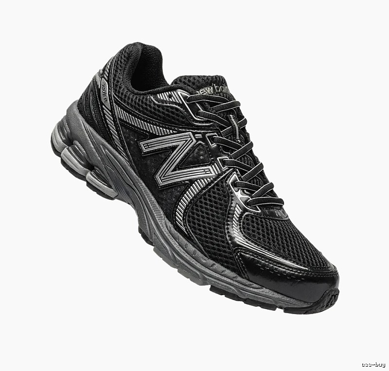 New Balance retro-style black and grey sports shoes