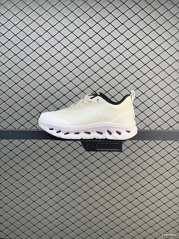 On Cloud Runners in White and Black, Finished with Layered Mesh Upper